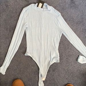 Light blue body suit